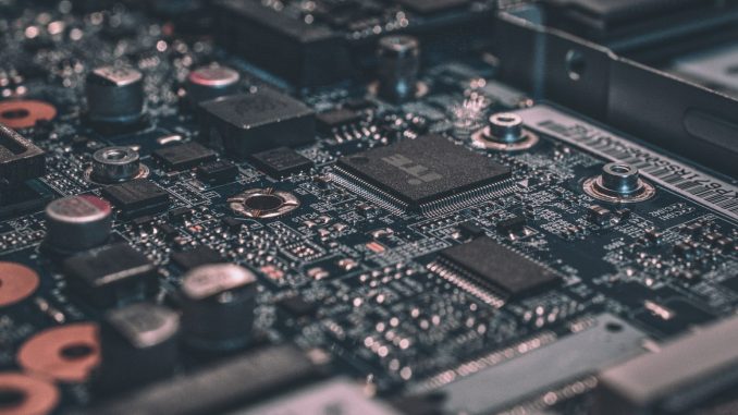 Glowing circuit board representing AI in architecture