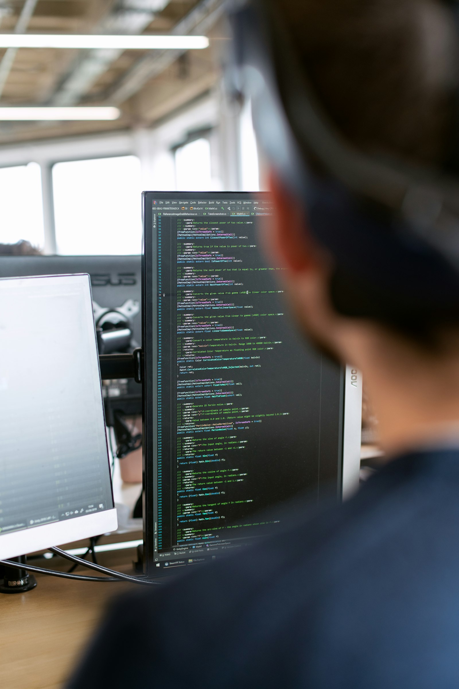 Architects reviewing BIM coordination on screen